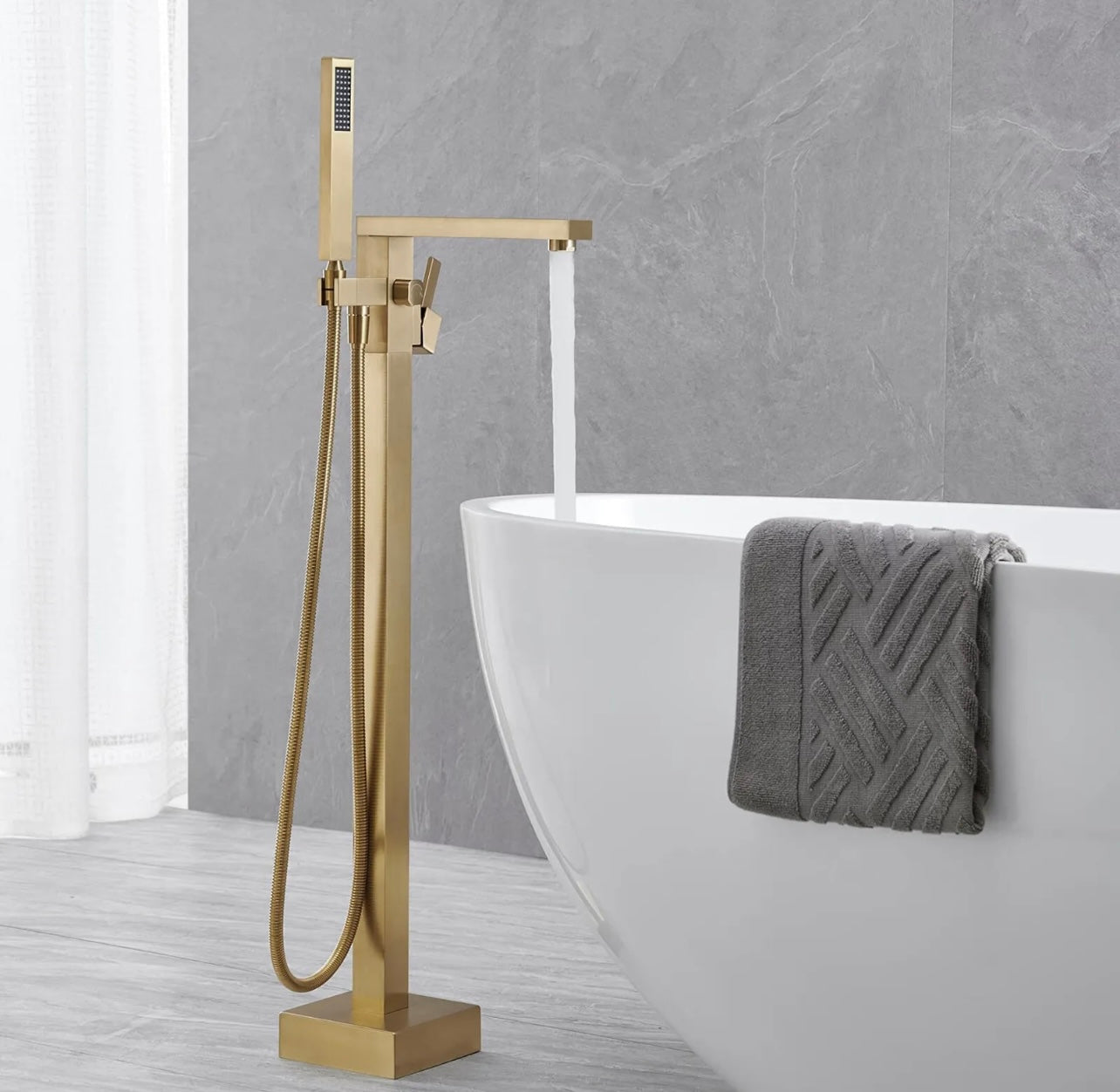 Brushed gold waterfall tub filler faucet