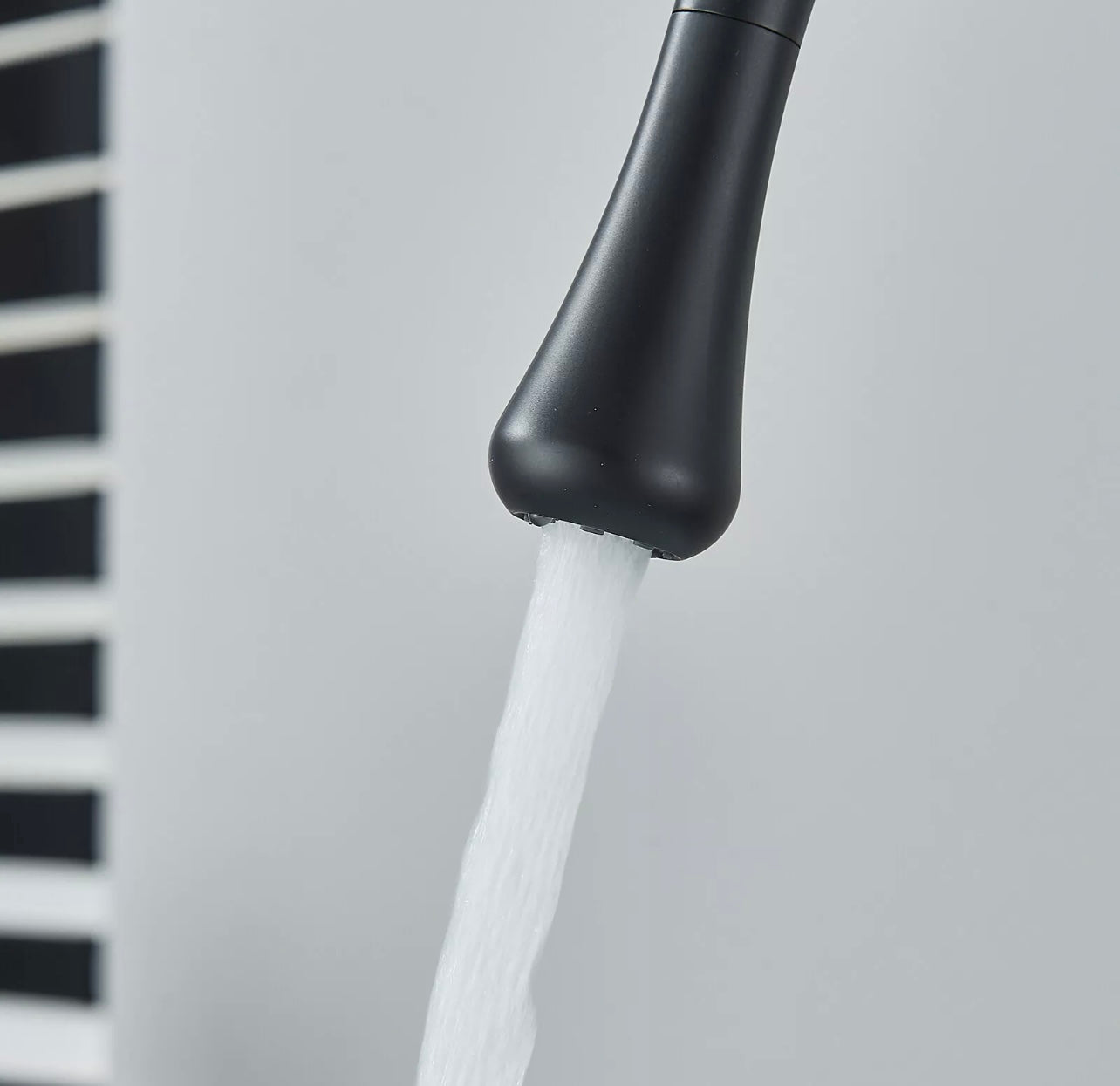 Matt black goose neck waterfall vessel faucet