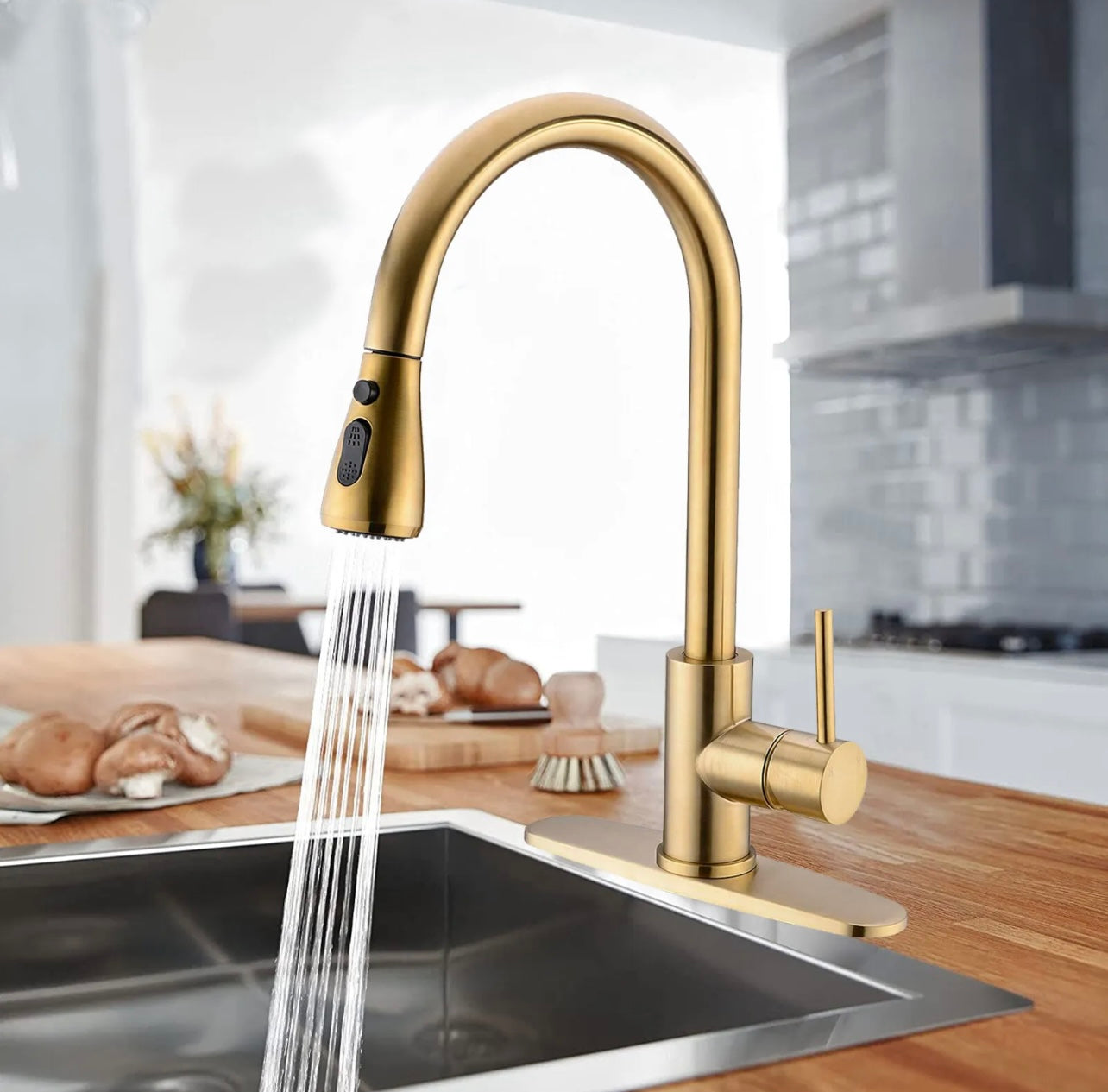 Brushed gold pull out kitchen faucet