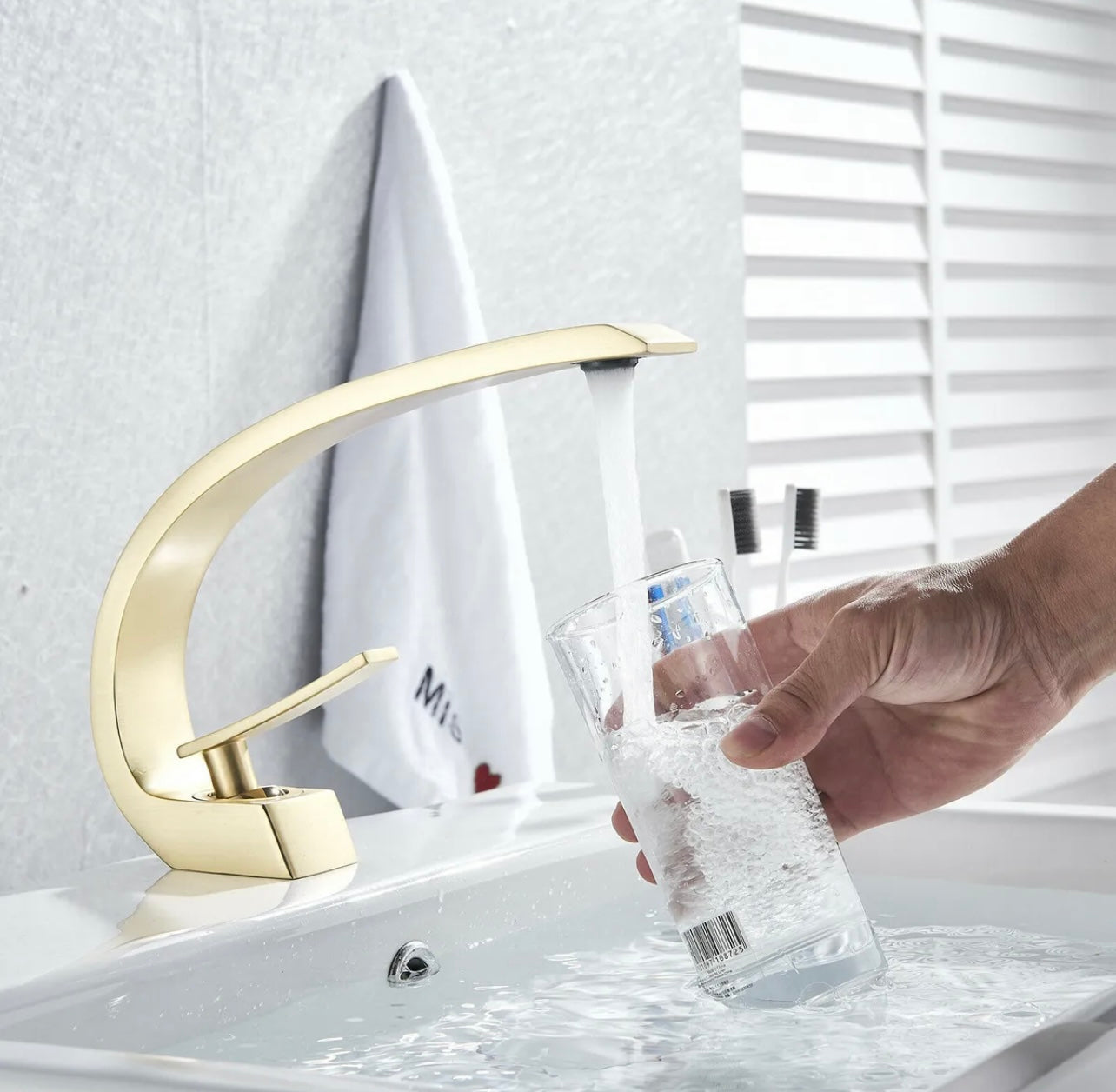#1383 BRUSHED GOLD CURVED WATERFALL VANITY FAUCET