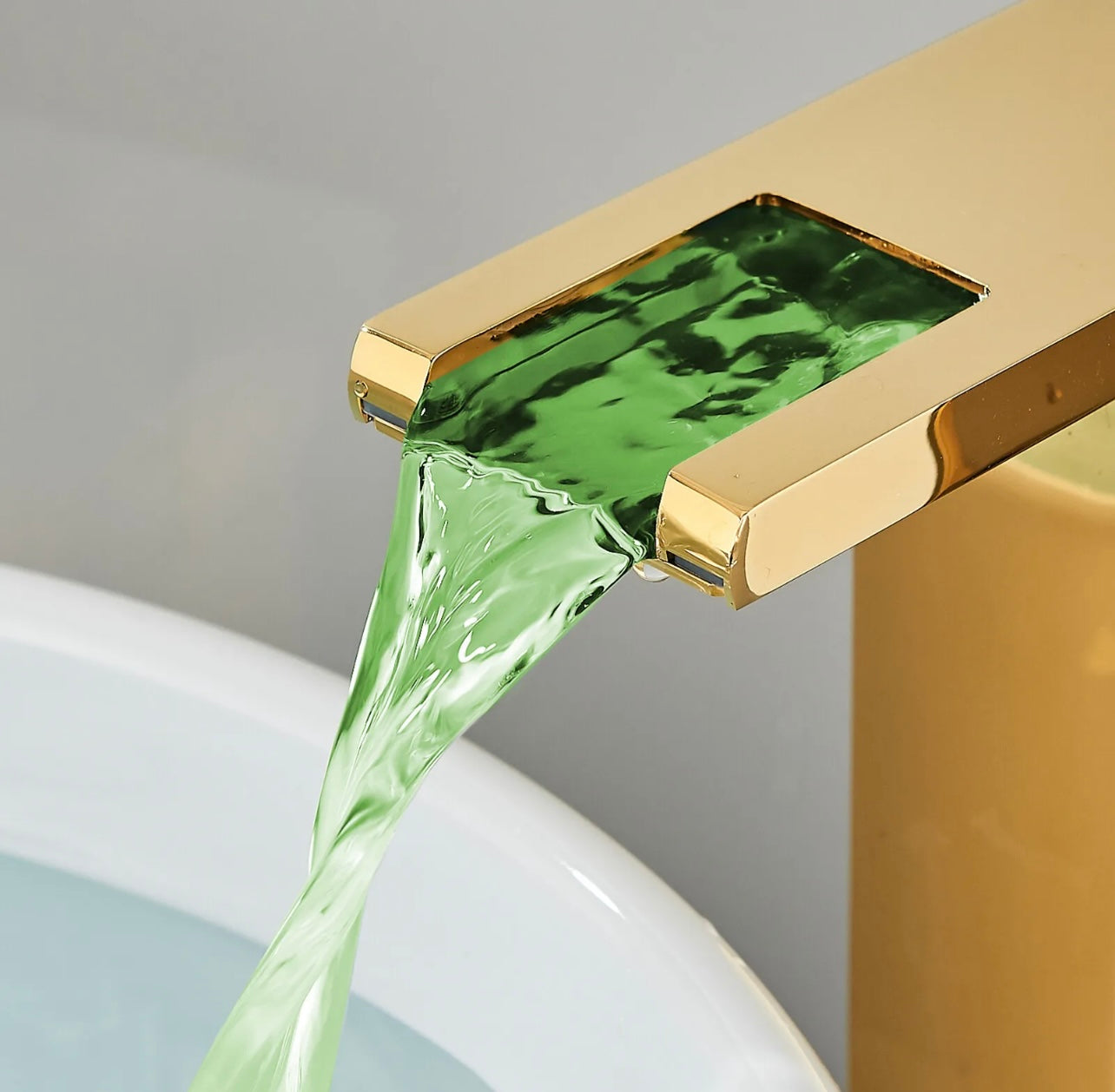 Gold led waterfall vessel faucet