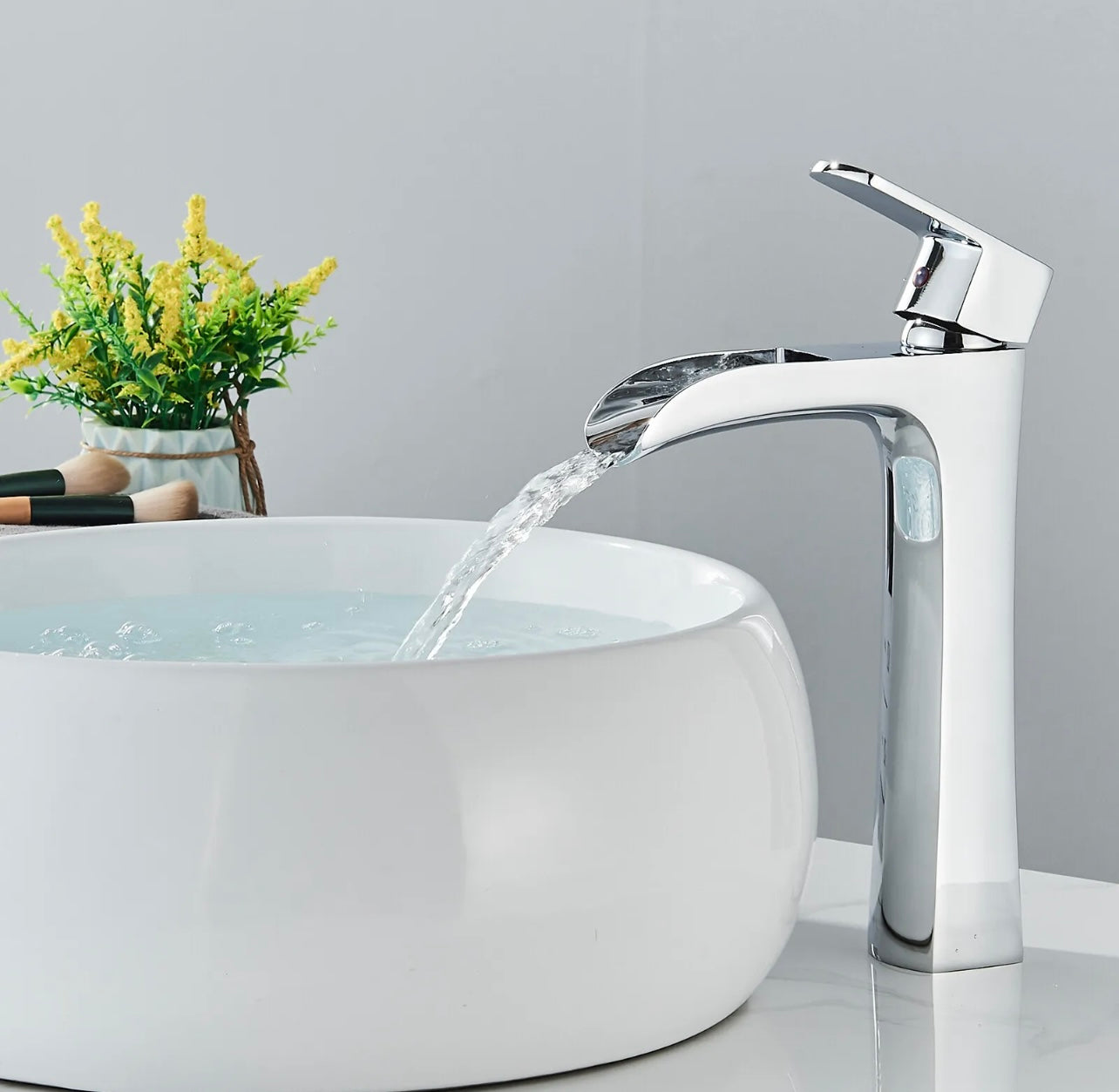 Chrome waterfall vessel faucet