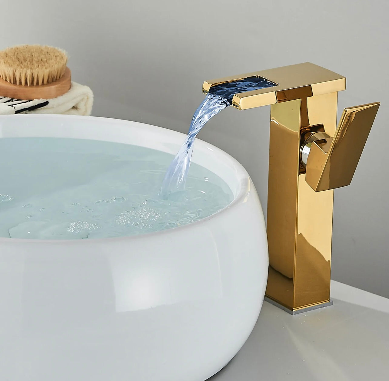 Gold led waterfall vessel faucet